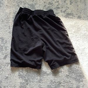 Two champion gym shorts. Youth medium. Light grey and black